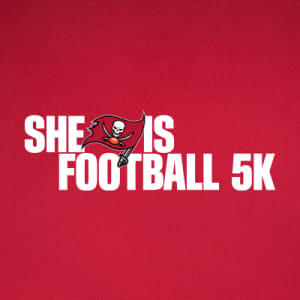 She is Football 5K Run, Walk & Stroll Logo