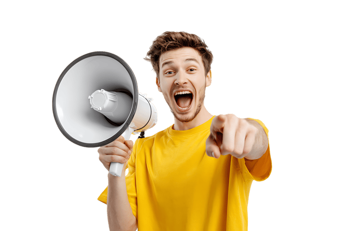 Young man shouting into megaphone, pointing at viewer. Announcement, news, advertisement concept.