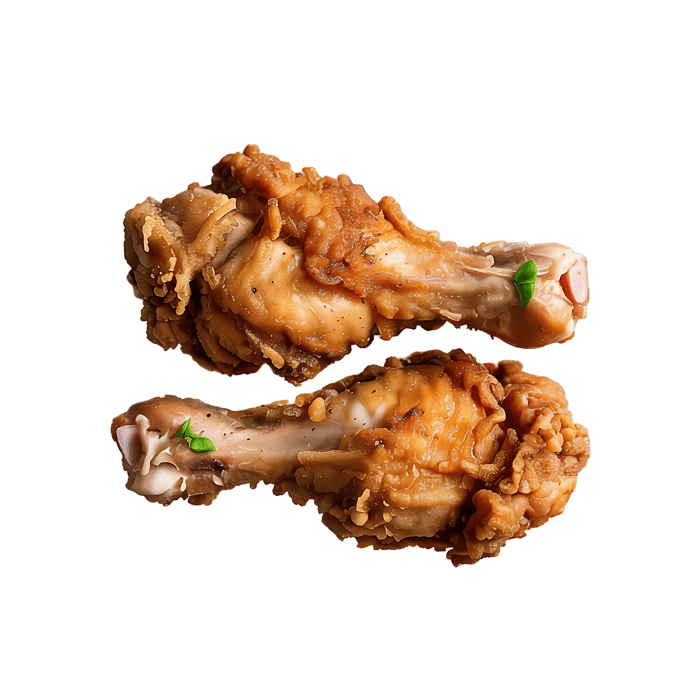 Crispy fried chicken drumsticks, close up.