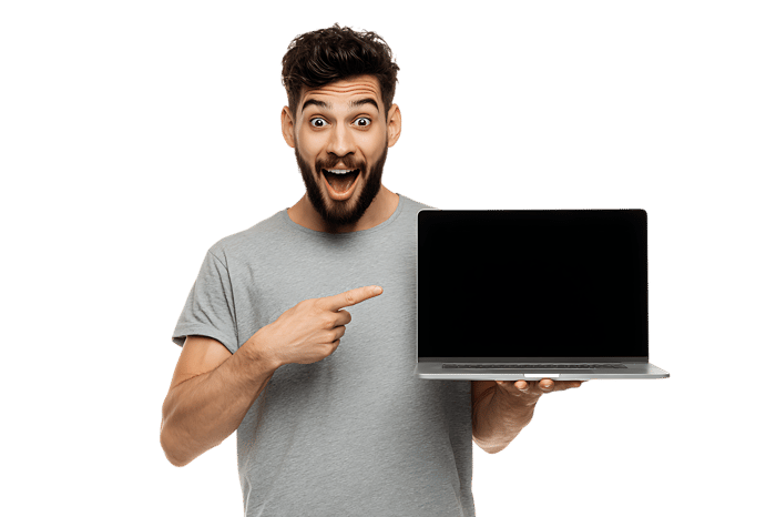Excited man presenting laptop with blank screen.