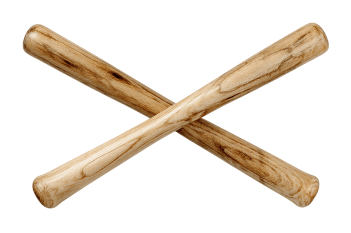 Pair of crossed wooden clubs, isolated on black background.