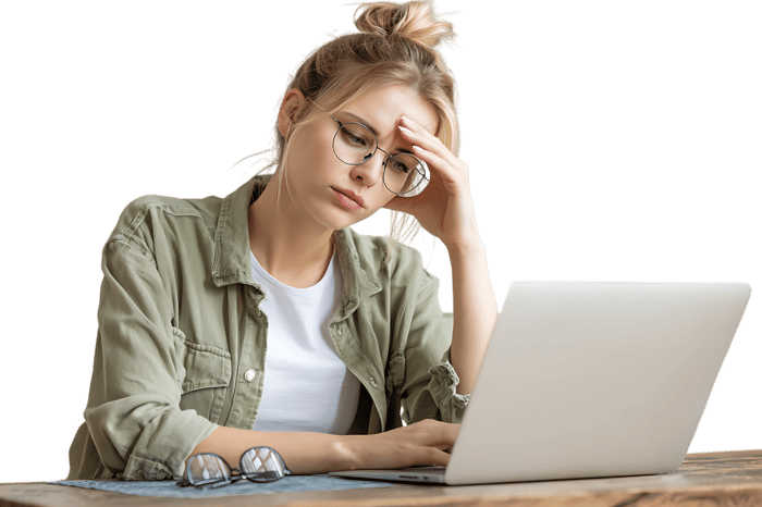 Tired woman working on laptop, feeling stressed