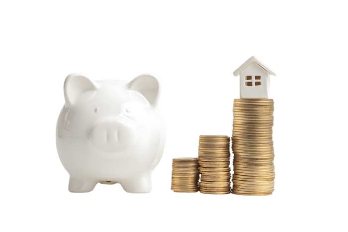 Piggy bank and coins stacking up to a house model