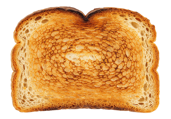 Perfectly toasted bread slice, close up.