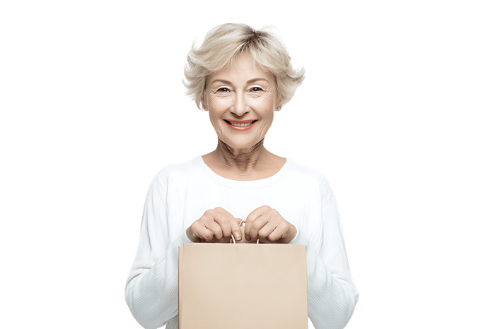 Happy senior woman holding a shopping bag