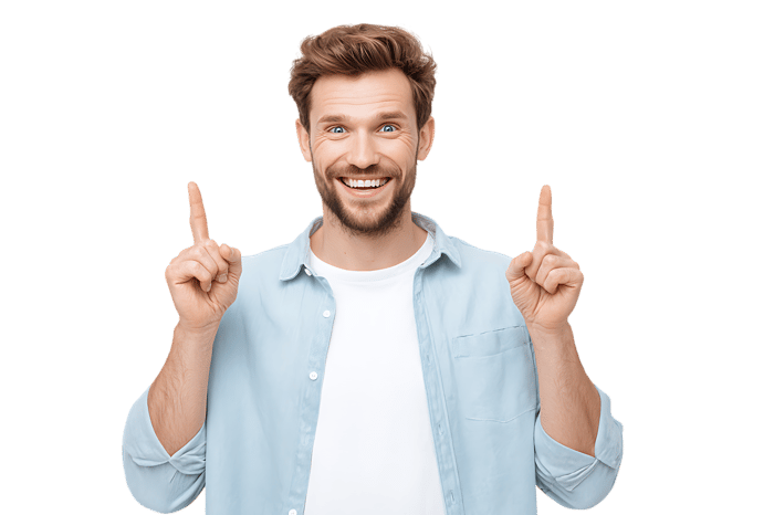 Happy man pointing up with both index fingers.