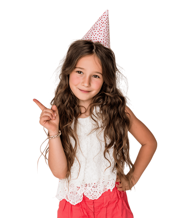 Adorable girl in party hat points.