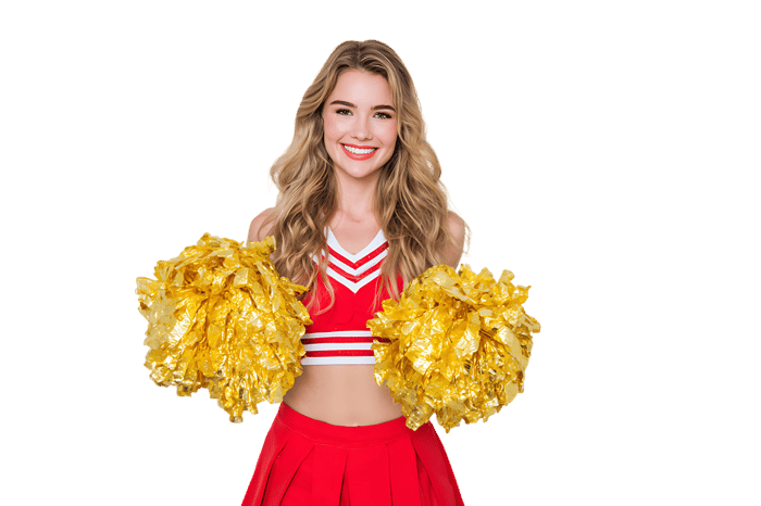 Smiling young cheerleader in red and white uniform