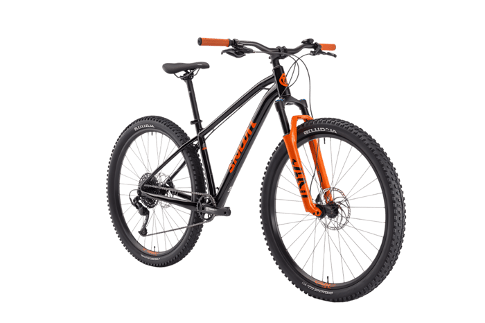 Black mountain bike with orange fork and handlebar grips