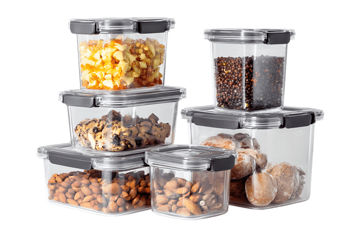 Stack of clear plastic food containers filled with various snacks.