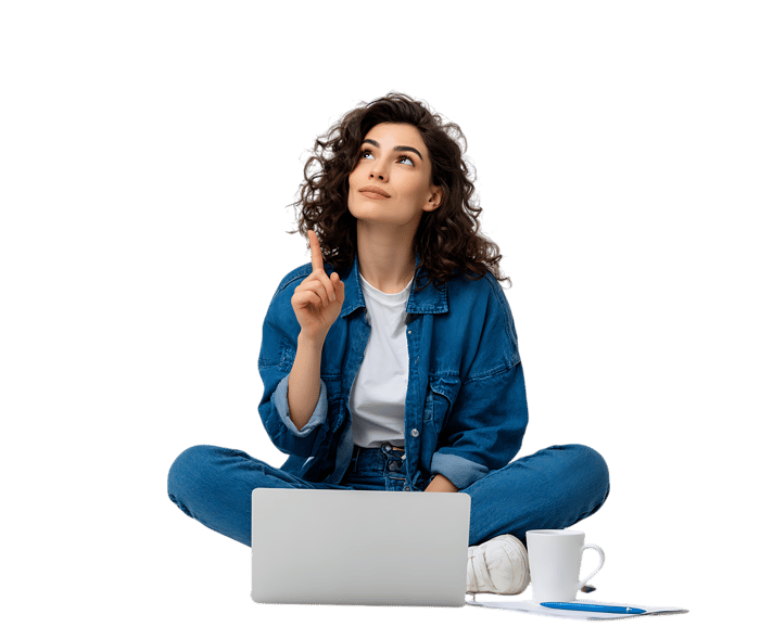 Woman has an idea while working on laptop, isolated on black.