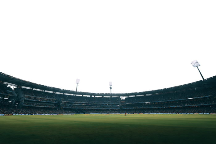 Night view of an empty stadium under floodlights.