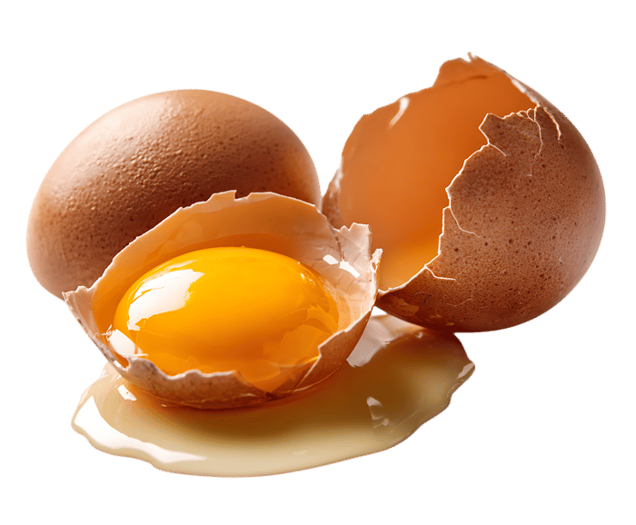 Close-up of a broken egg, yolk visible