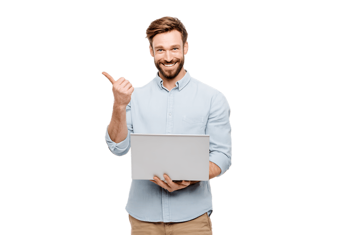 Smiling man holding laptop, pointing sideways.