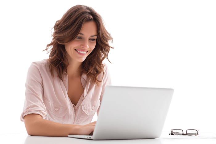 Smiling woman working on laptop