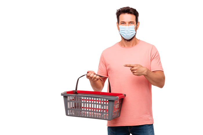 Man in mask holds shopping basket