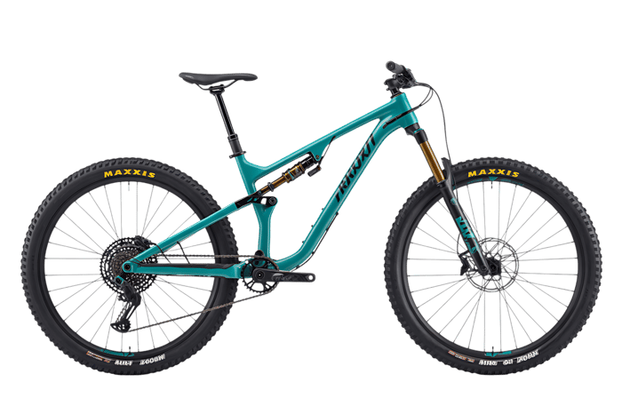 Teal mountain bike for extreme sports and outdoor recreation