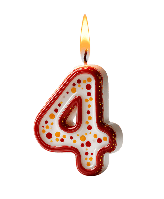 A lit number four candle