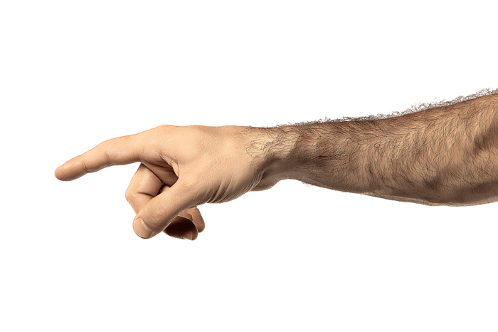 Close up of a male hand pointing to the left.