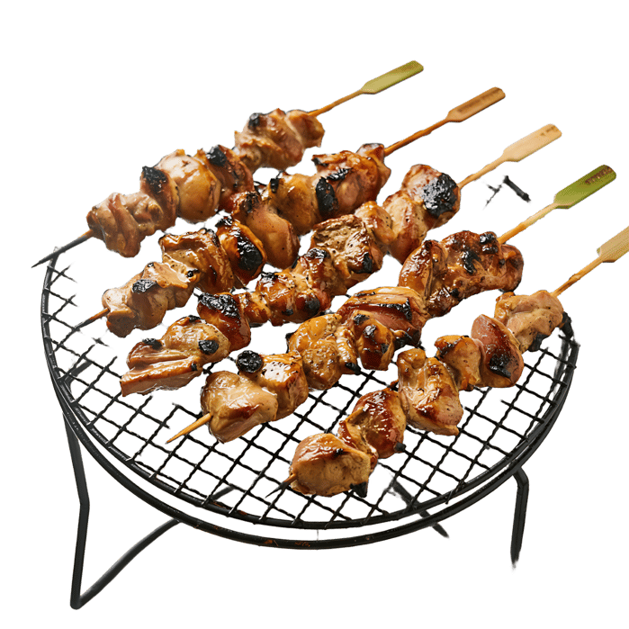 Delicious grilled chicken skewers on a barbecue grill.