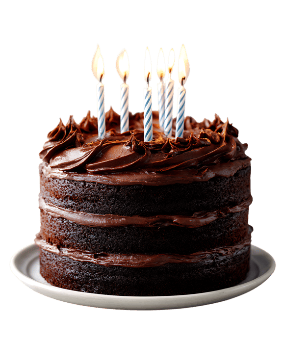 Chocolate layer cake with lit candles