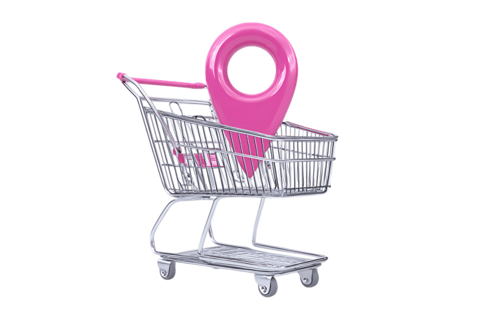 Pink map pointer in a shopping cart, online shopping, geolocation