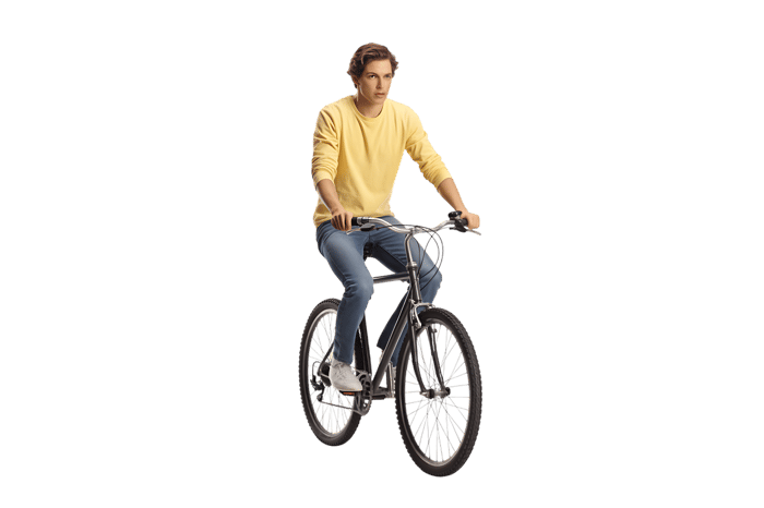 Young man riding a bicycle isolated on transparent background
