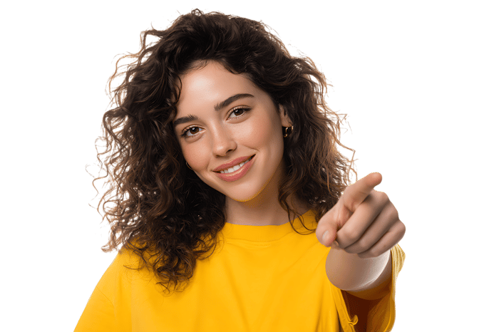 Young woman pointing her finger at you. You're chosen!