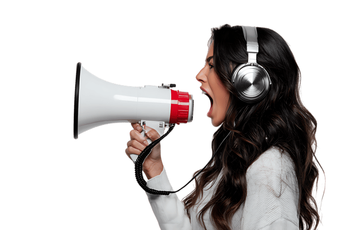 Young woman using a megaphone, making an announcement or protest.