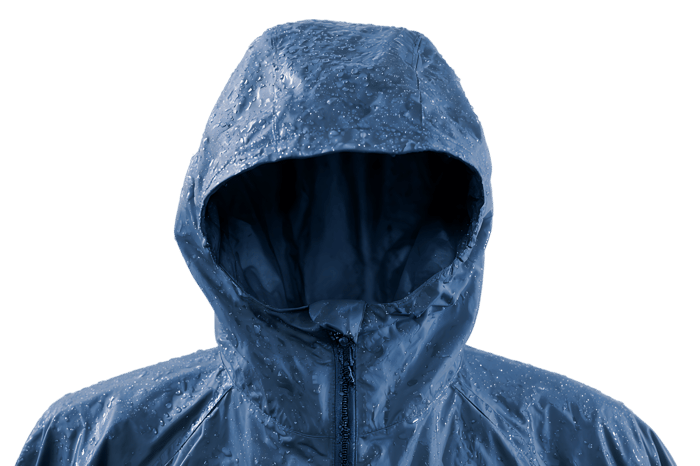 Close up of a wet blue hooded jacket. Rain, waterproof, outdoor gear.
