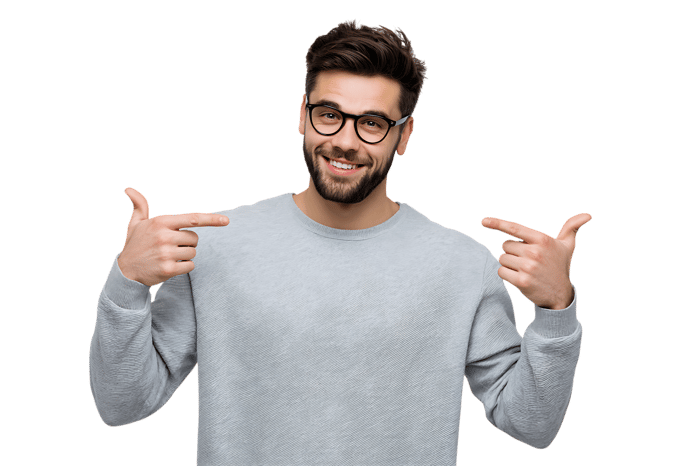 Man proudly pointing towards himself with a confident smile.