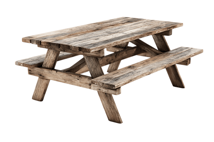 Weathered wooden picnic table, perfect for outdoor settings.