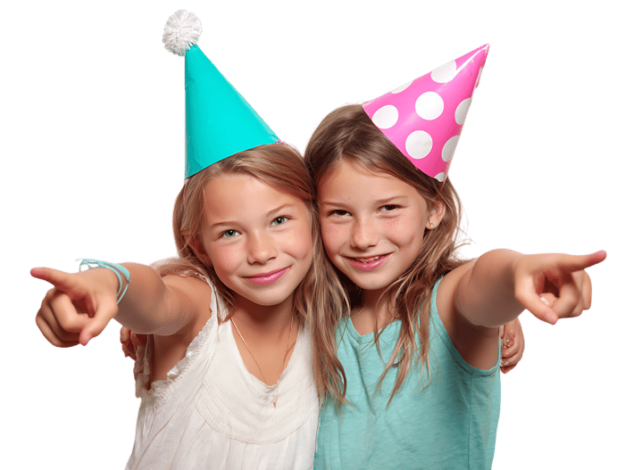 Two girls pointing, party hats on
