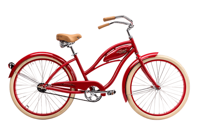 Red classic cruiser bicycle isolated on black background.