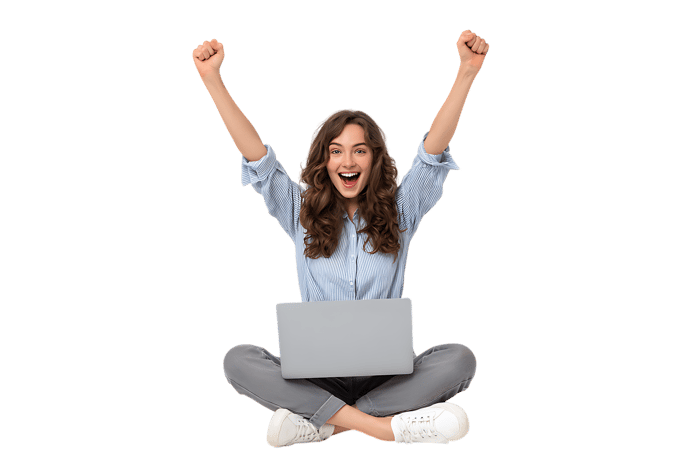 Happy woman celebrating success on laptop