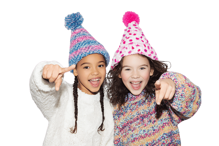 Two girls point playfully! Winter fun!