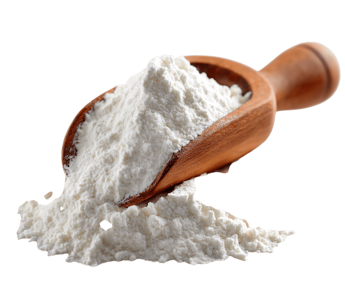Wooden scoop overflowing with flour
