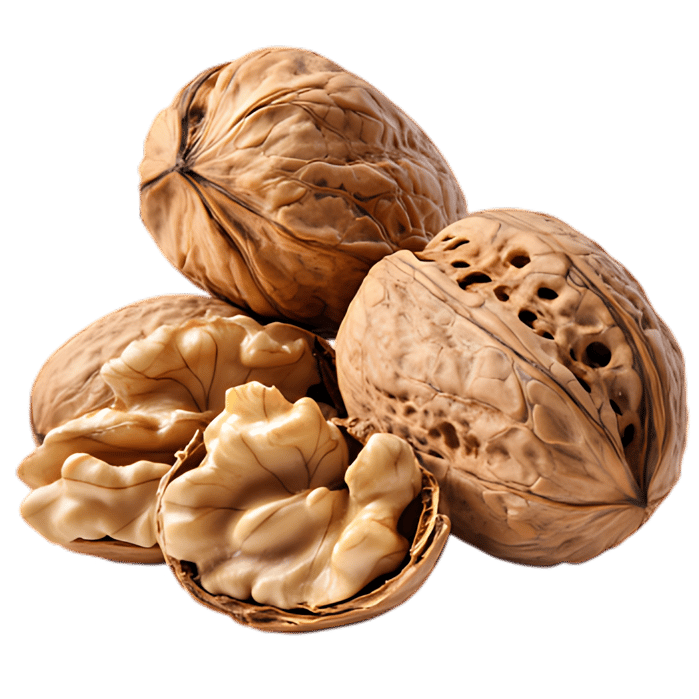 Close up of walnuts, one cracked open.