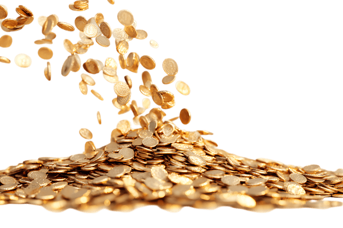 Golden coins falling onto a pile