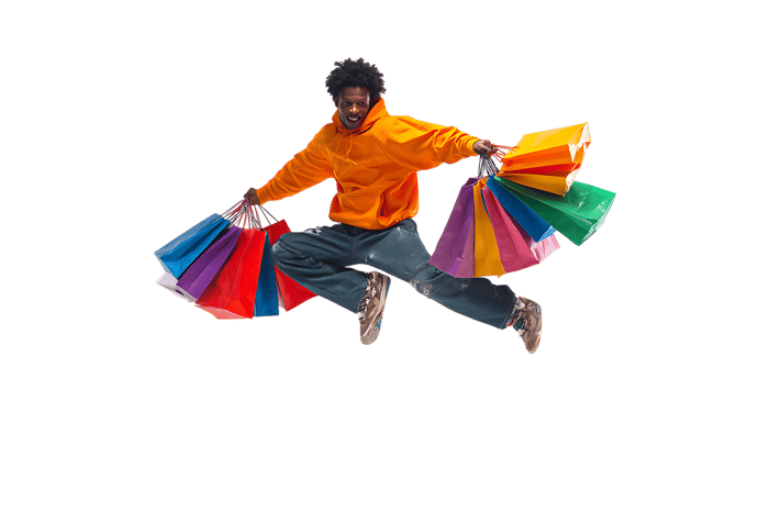 Joyful man leaps with shopping bags