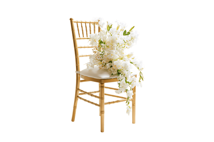 Wooden chair adorned with cascading white flowers