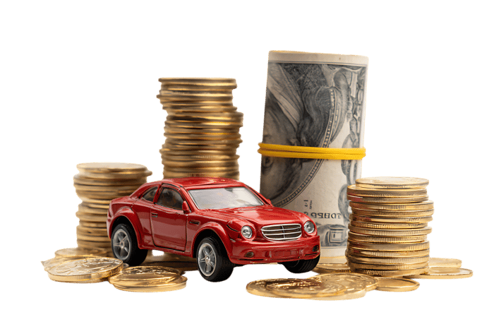 Red toy car surrounded by stacks of coins and rolled up banknotes.