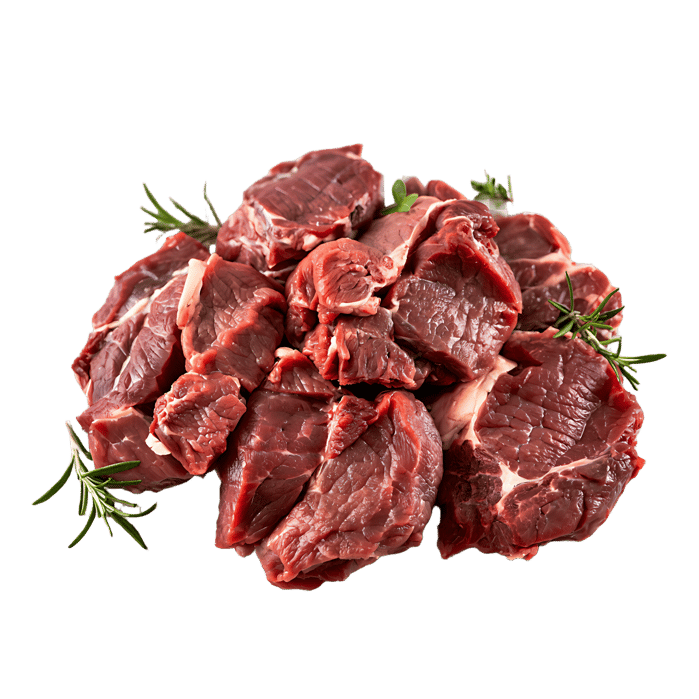 Close up of raw beef stew meat with rosemary sprigs.