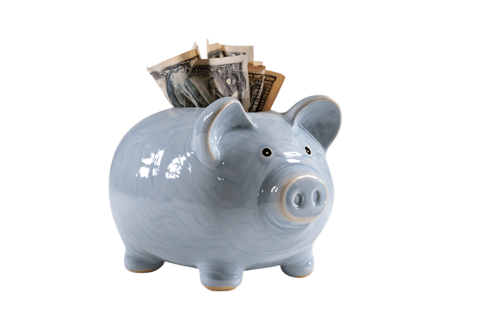 Light blue piggy bank with dollar bills505.