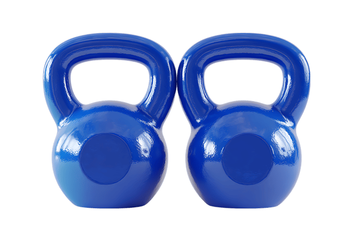 Pair of blue kettlebells for fitness and strength training