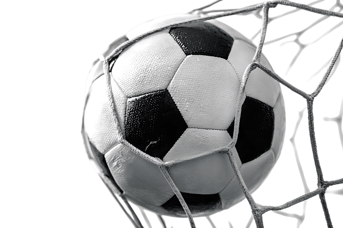 Soccer ball in net goal victory success