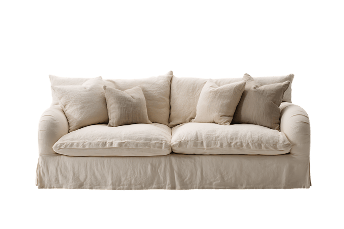Comfortable beige sofa with soft linen cushions