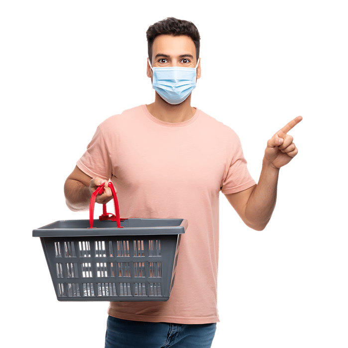 Young man in mask with shopping basket