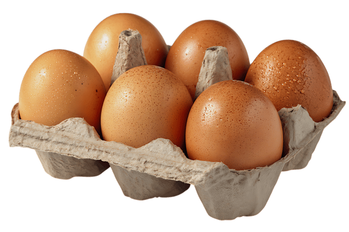 Six brown eggs in a cardboard carton