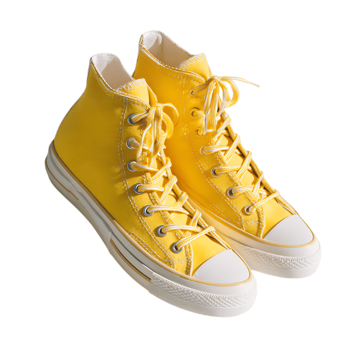 Pair of vibrant yellow high top sneakers isolated on transparent background.